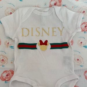 Disney “Gucci” onesie